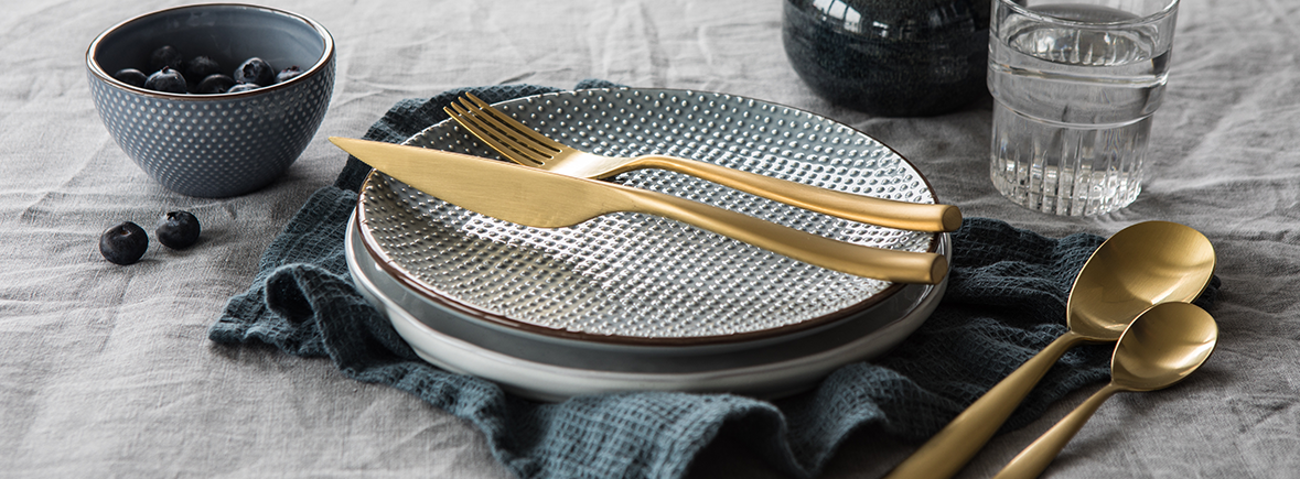 gold titanium flatware by Mepra